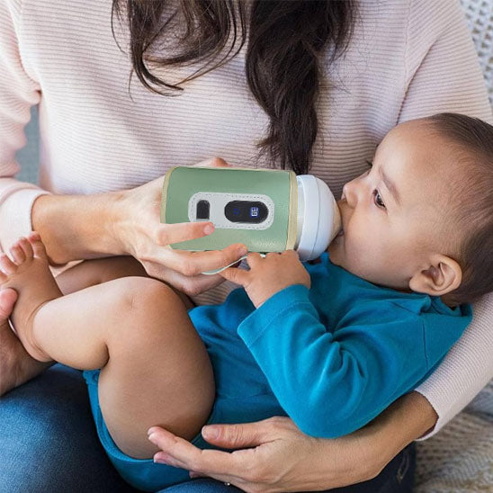chauffe biberon portable bébé bras de sa maman